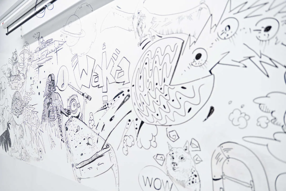 Assumption English School - Dry Erase IdeaPaint walls breaks the boundaries of traditional whiteboard panels.
