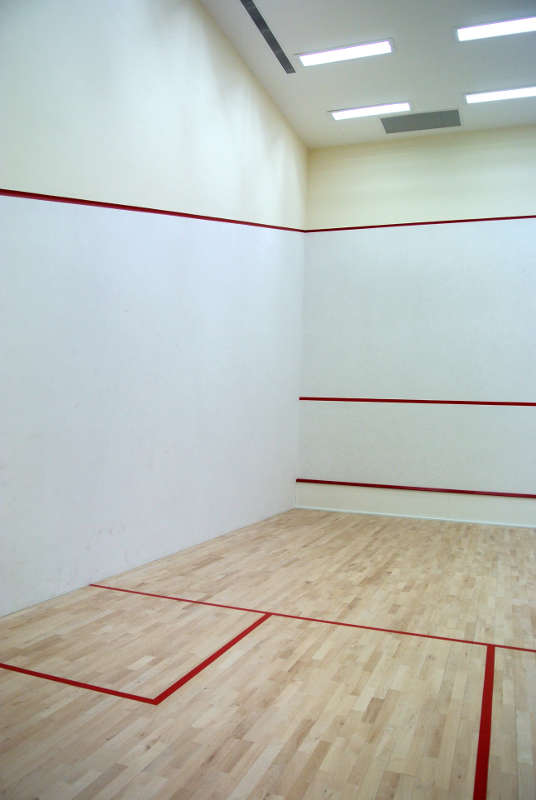 ACJC Squash Court - With Armourcoat specialist heavy duty walls, Junckers sports grade pre-finished timber flooring, and specialist glass walls and doors, to comply with necessary standards.