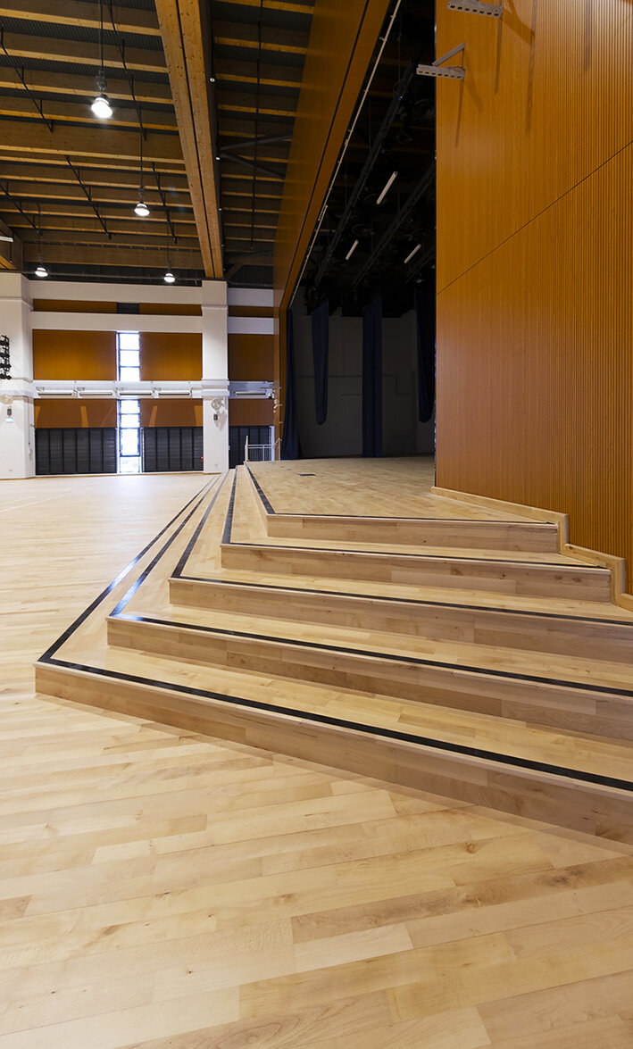Multipurpose hall stage- Junckers Beech Harmony timber flooring