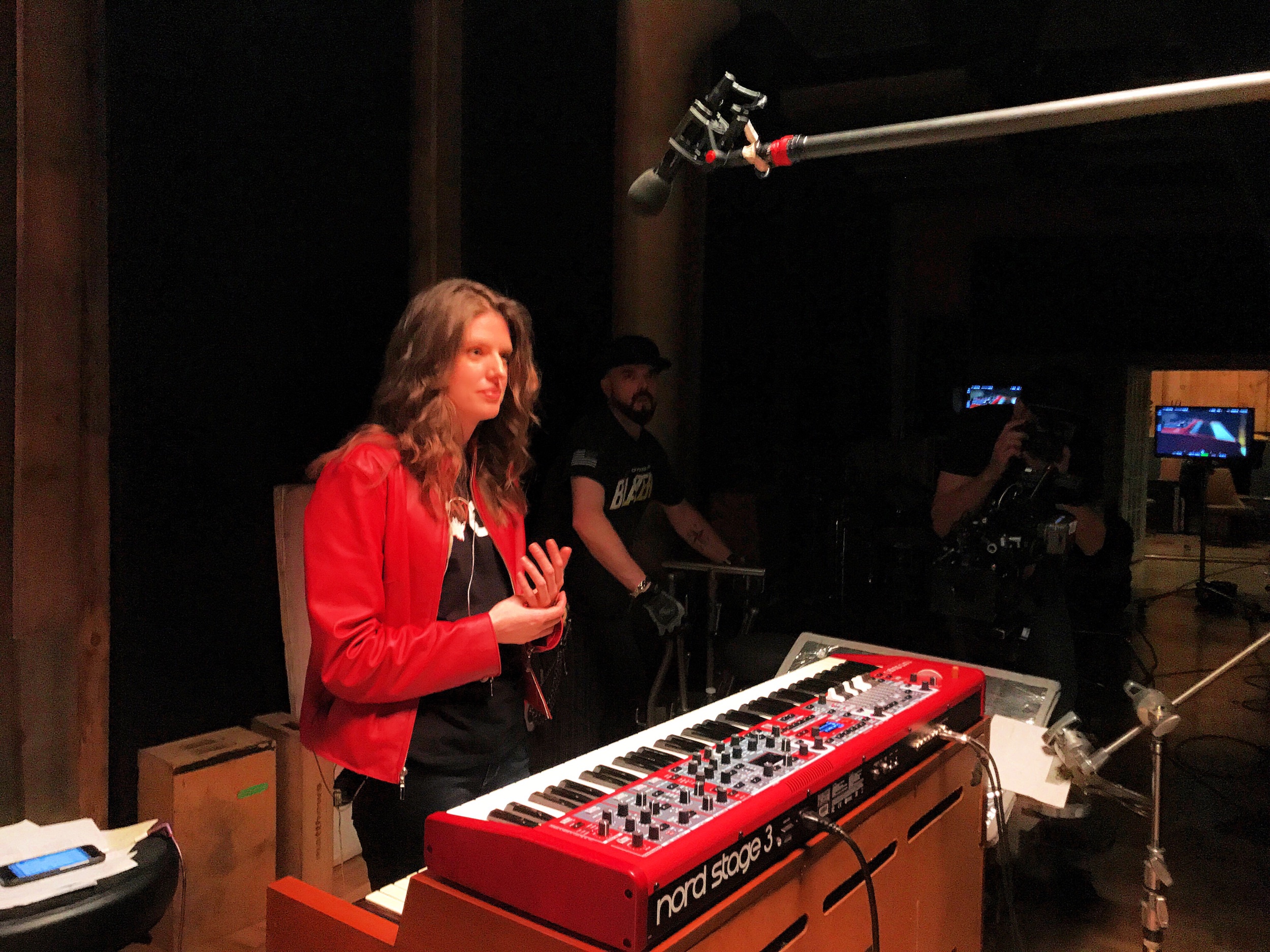 On-set between takes filming keyboard tutorials