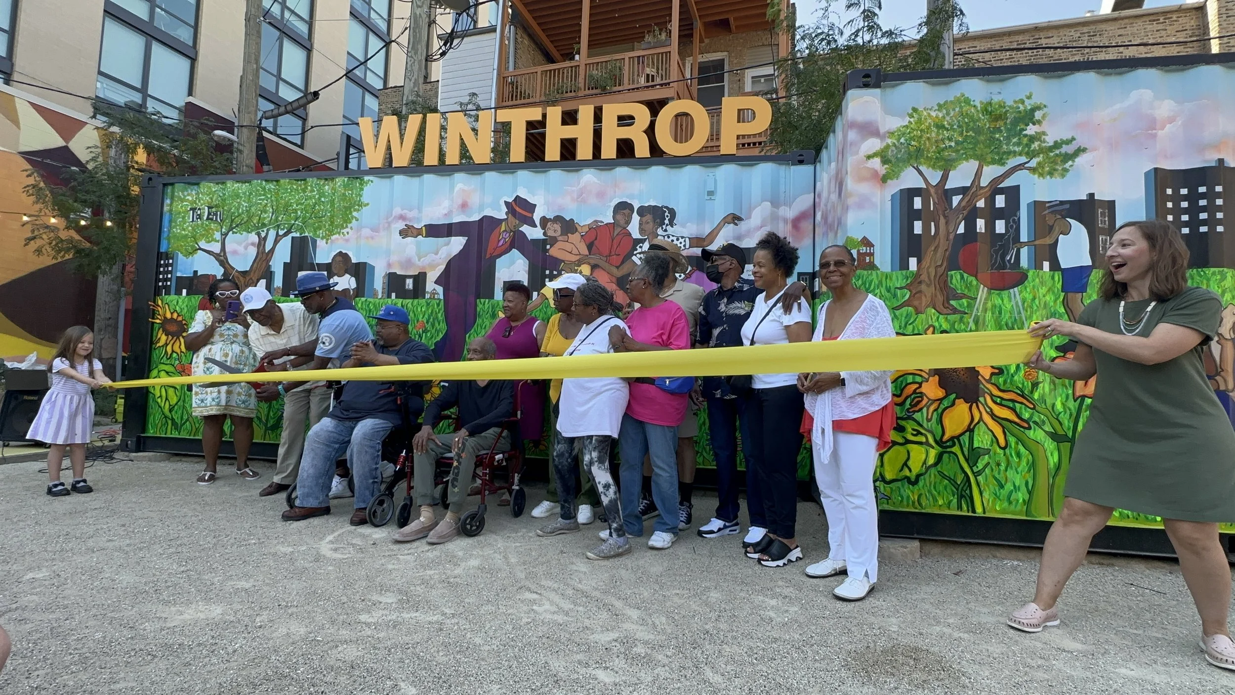 Ribbon cutting at the mural dedication event on September 14, 2024.