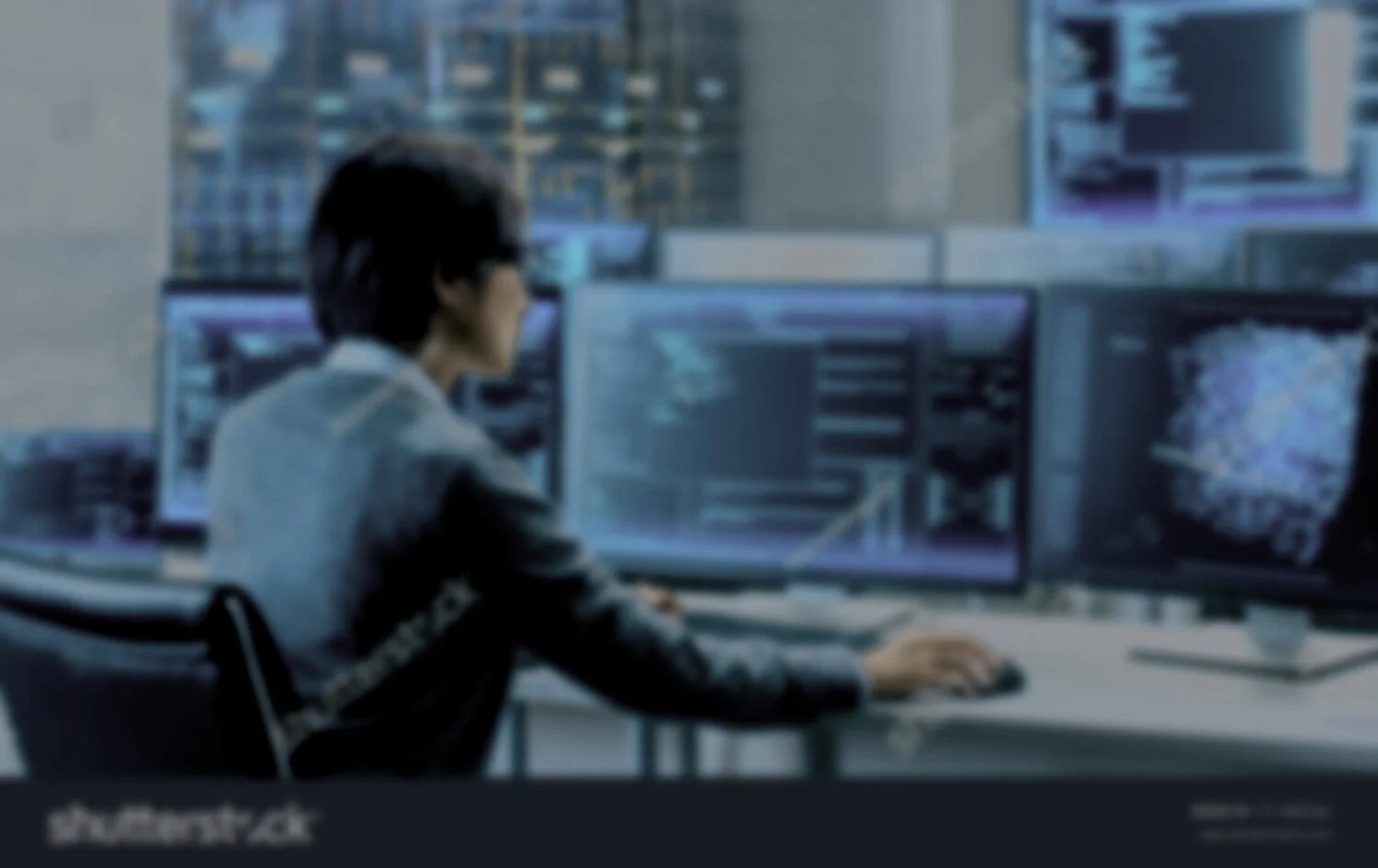 stock-photo-in-the-system-control-room-technical-operator-works-at-his-workstation-with-multiple-displays-771480466.jpg