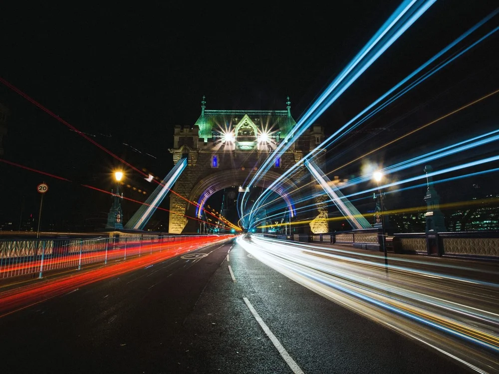 City traffic at dusk with light trails