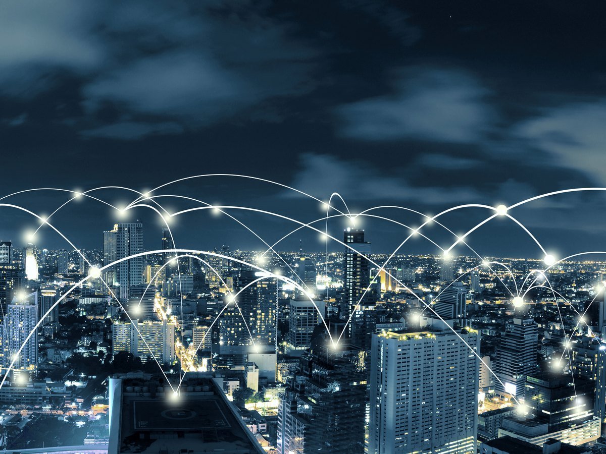 City skyline with a connected network overlay
