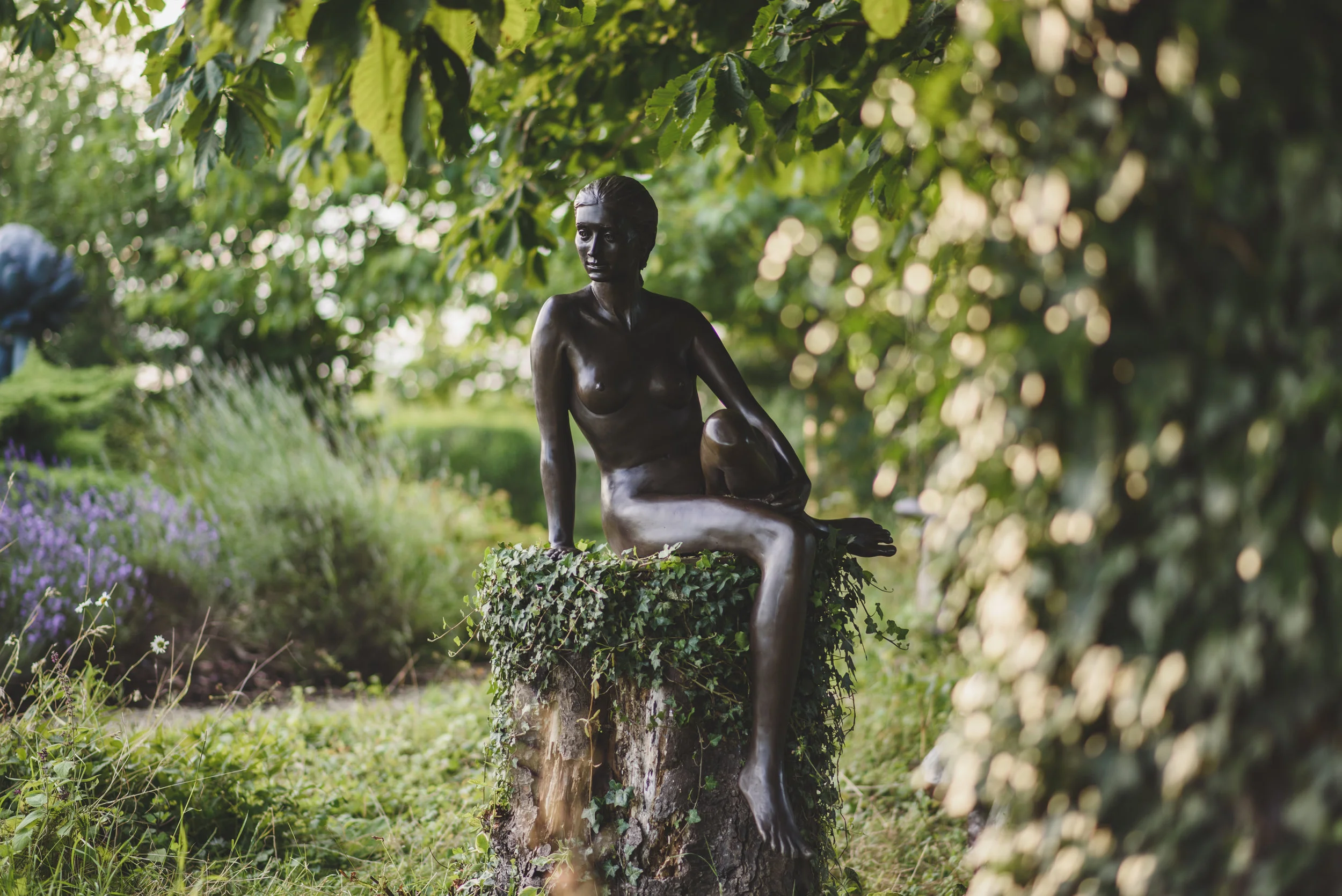 Nude Sitting Holding Leg