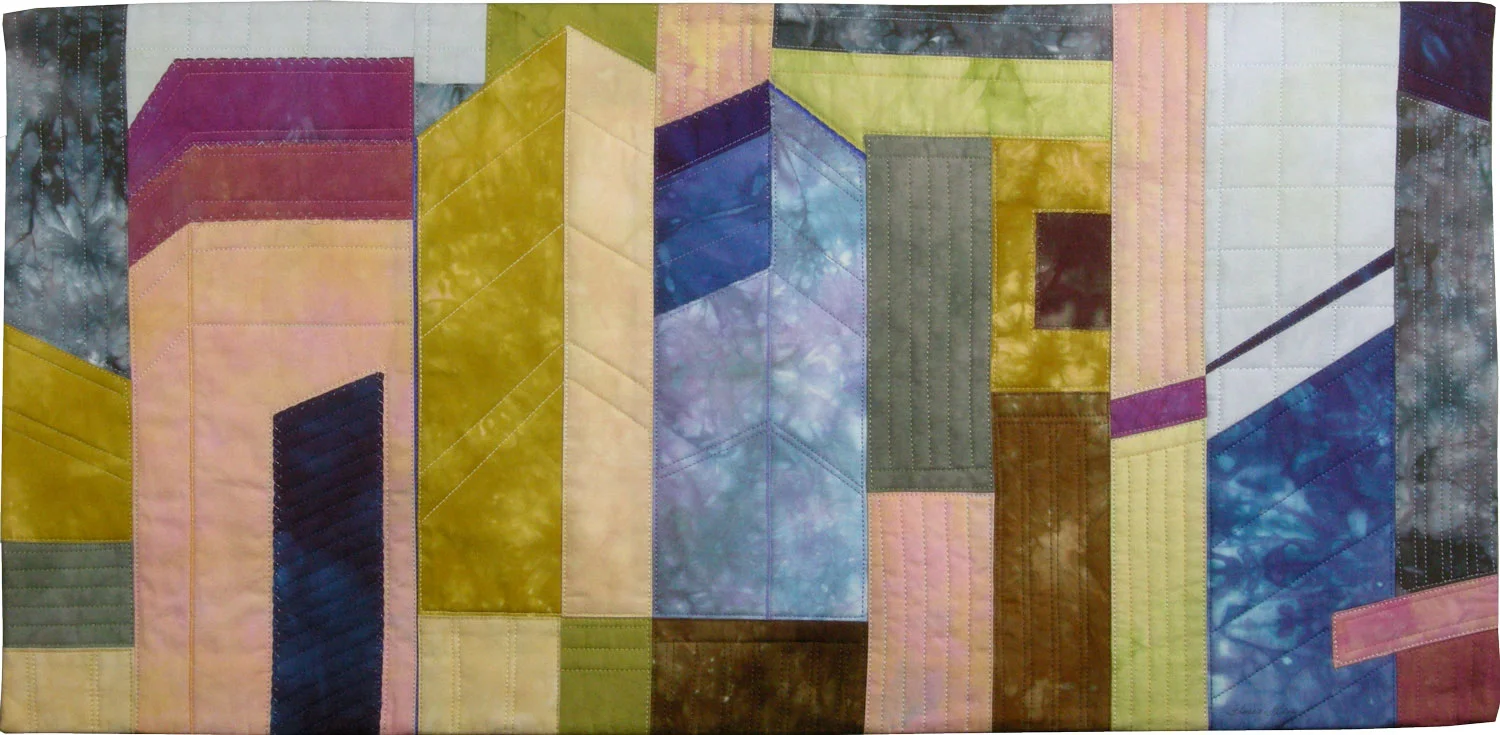 Cityscape 4 ©2010 • 12"L x 25"W • $425 Artist-dyed cotton fabric Machine pieced and machine quilted