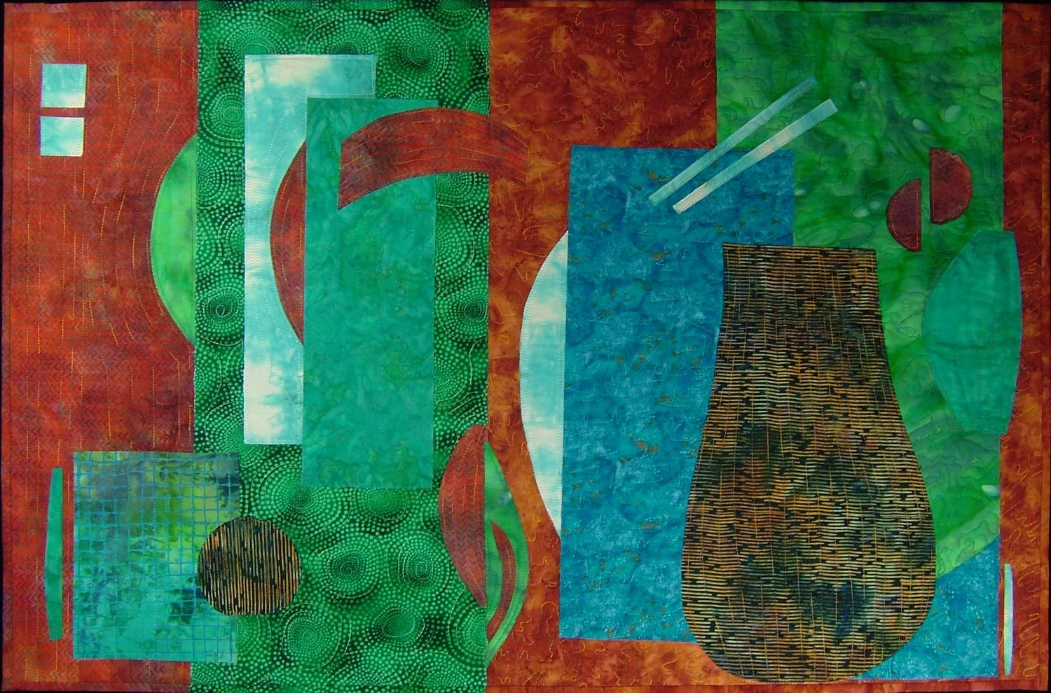 Symmetry 2 ©2005 • 21"L x 32"W • $800 Commercial and artist-dyed cotton fabric Fabric collage with machine stitching