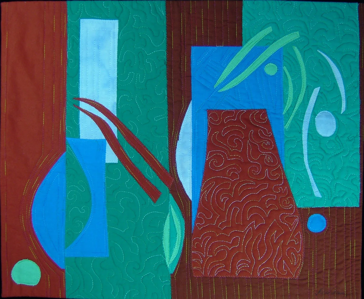 Symmetry 1 ©2005 • 16"L x 19"W • $300 Commercial and artist-dyed cotton fabric Fabric collage with machine stitching