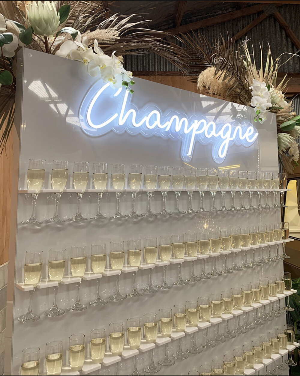 White Champagne Wall - Wedding & Event Designer