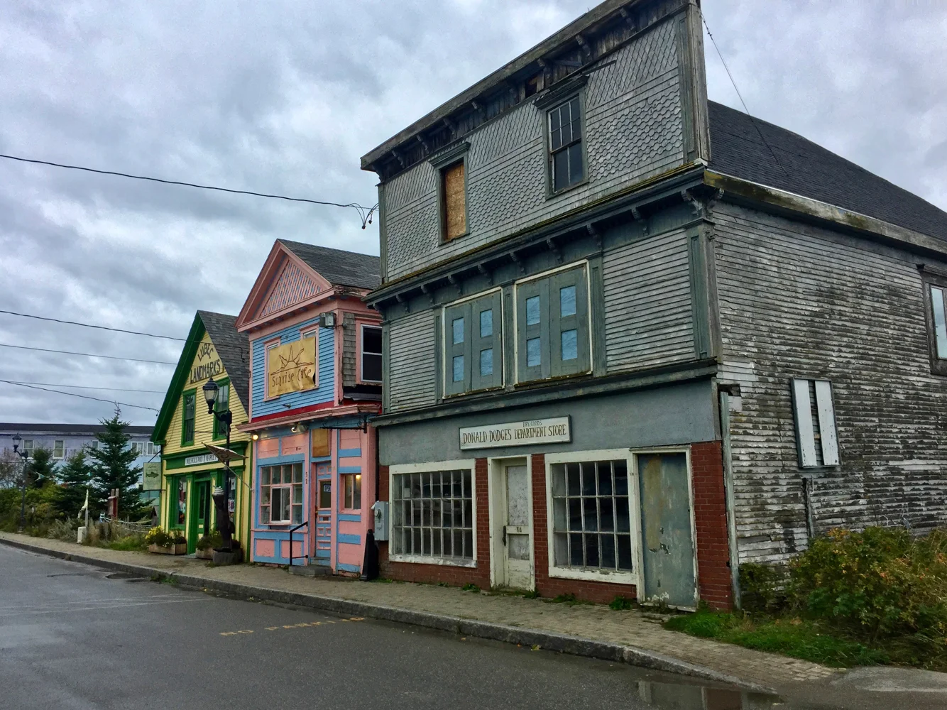 Maine street Lubec Maine, the eastern most town in the US. It is thought provoking how the depressed northern most areas of one country are adjacent to the far more affluent southern borders of the next. Food for thought.