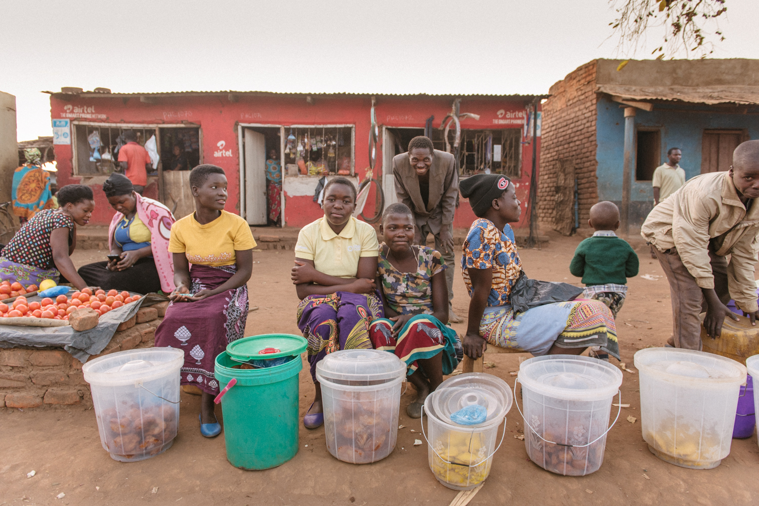 Women selling donuts and sweet potatos