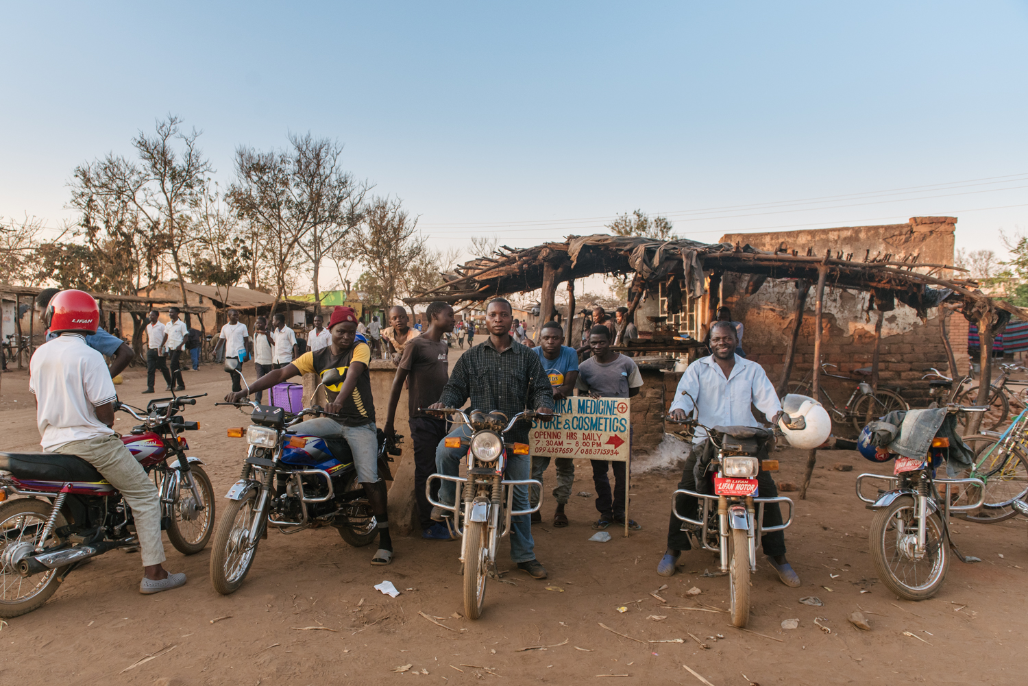 Friends show off their motorcycles at the “bike bar.”