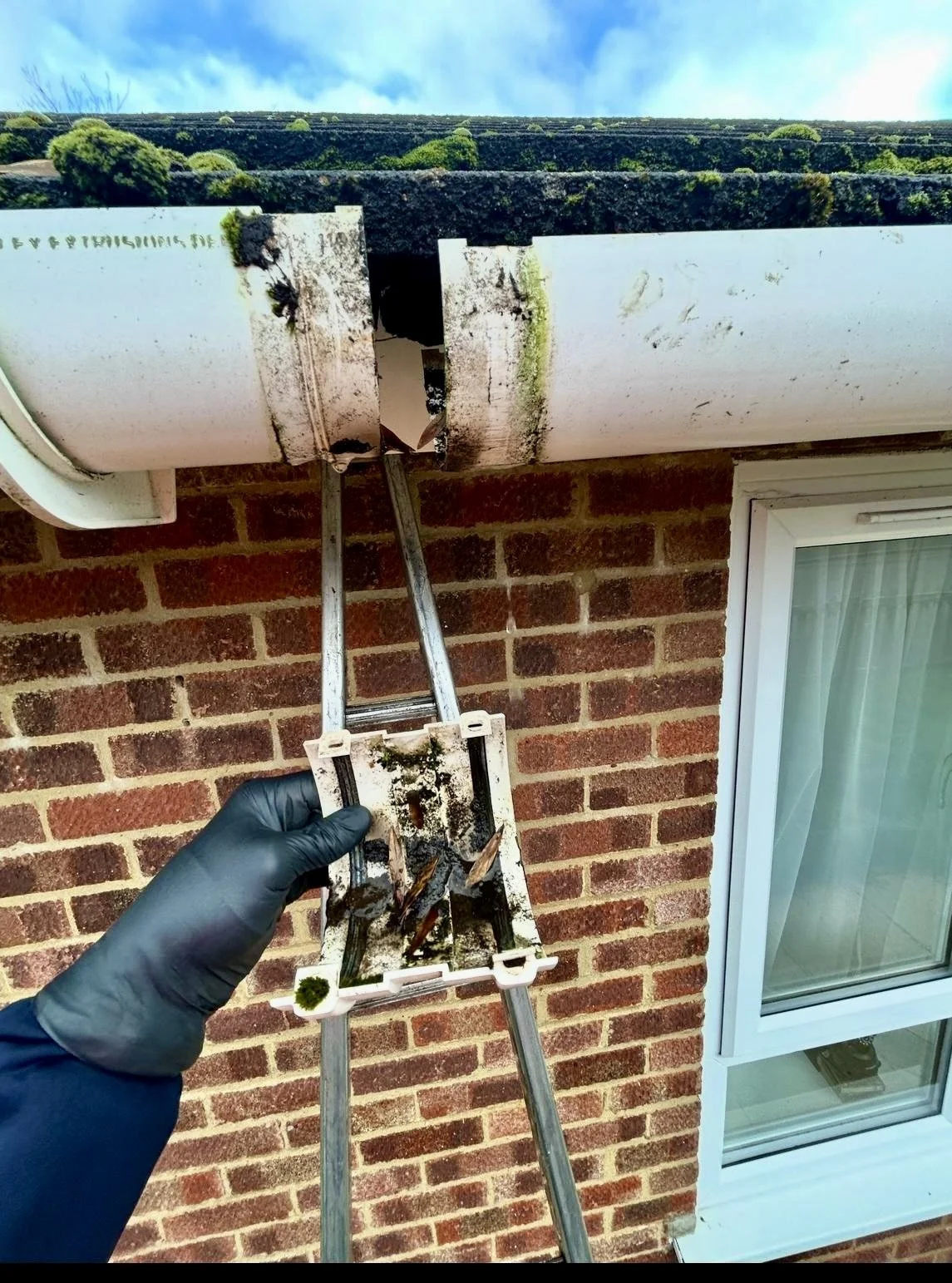 Gutter 2 broken before.jpeg