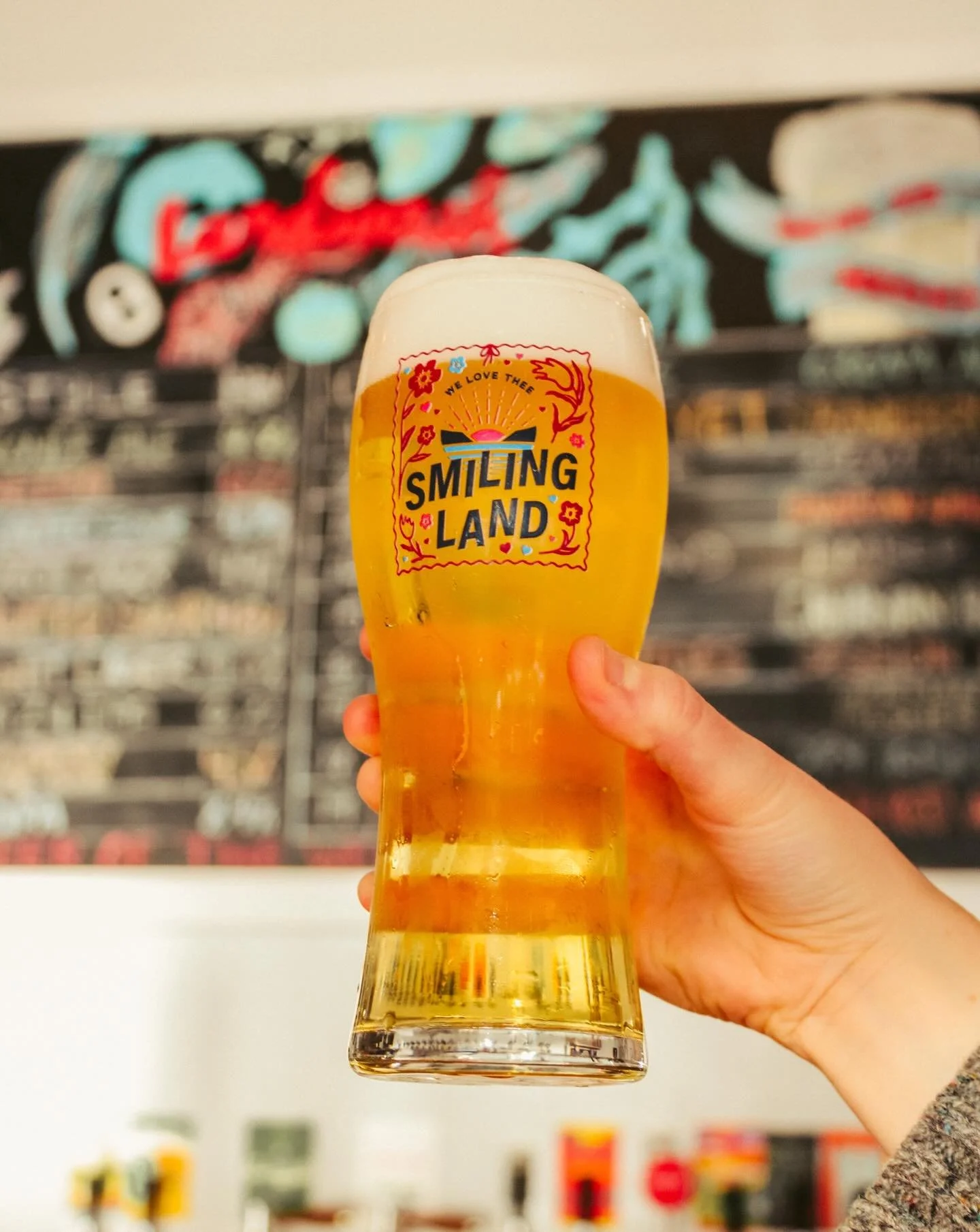 New Limited Edition Smiling Land Glasses!
🚨
You guys showed these glasses so much love last February, we decided to release a brand new version just in time for Valentine&rsquo;s Day! Beginning this week, when you grab a Smiling Land 12 pack at a pa