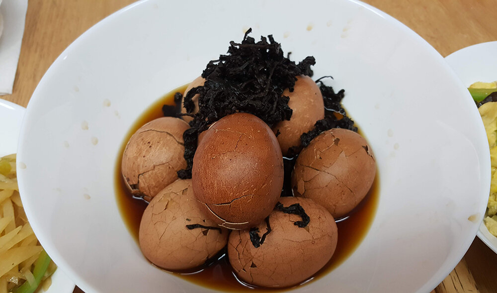  Our dish: tea eggs (茶叶蛋). 