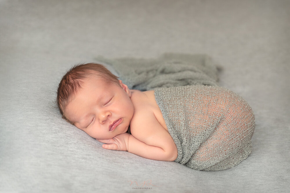 Photo shoot of newborn baby posed by NP Photography