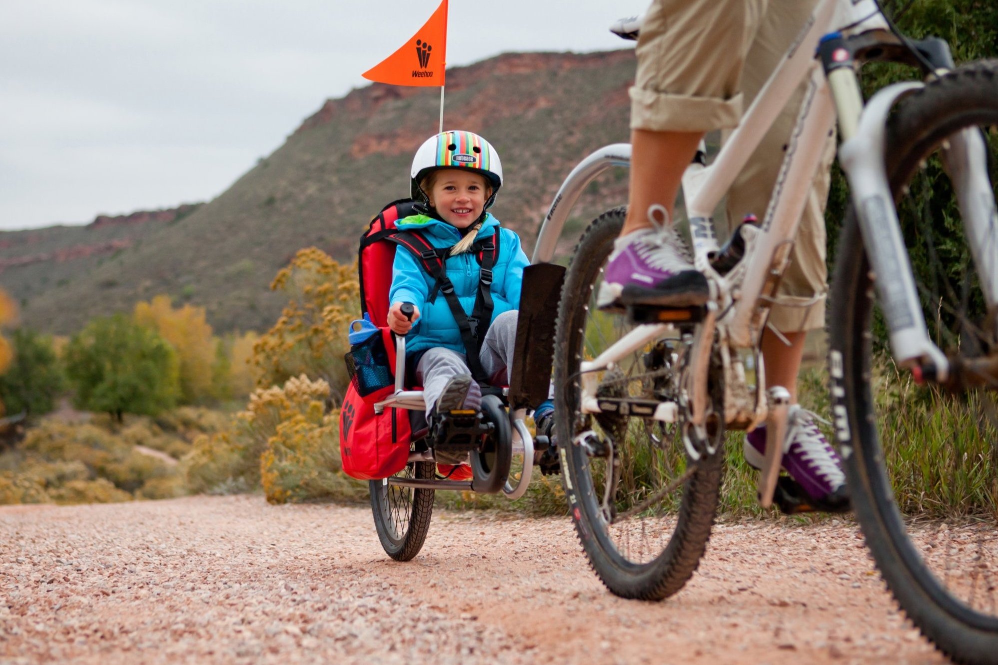 Remorque Weehoo participative pour enfants à vélo