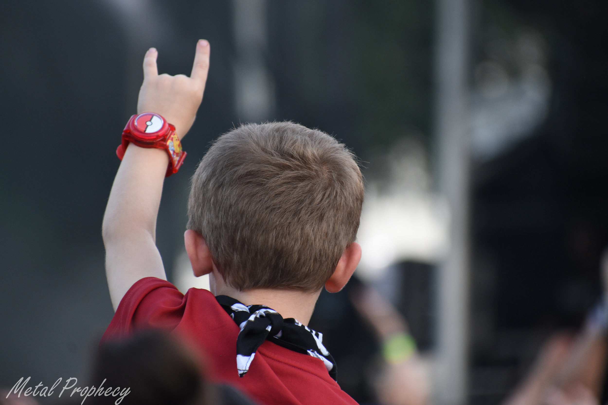 A young fan feels it as Yelawolf performs at Welcome to Rockville 2019