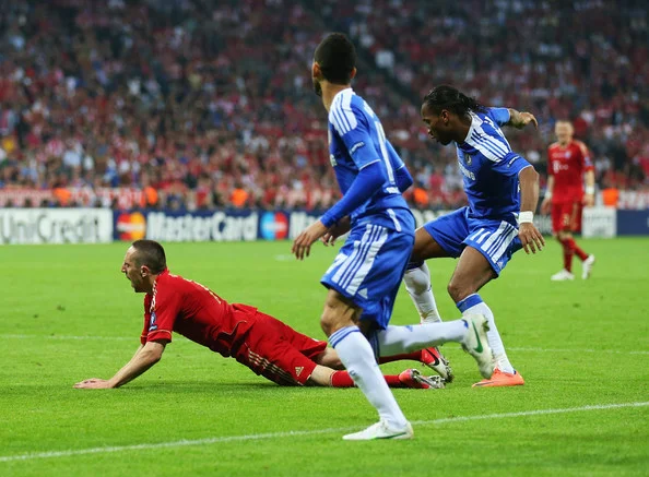 Drogba commits a foul on Ribery just 4 minutes into extra time.