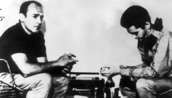 Di Stefano and Del Rio play checkers at the hide out.