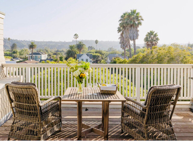 Inn penthouse table Table with flowers.jpg