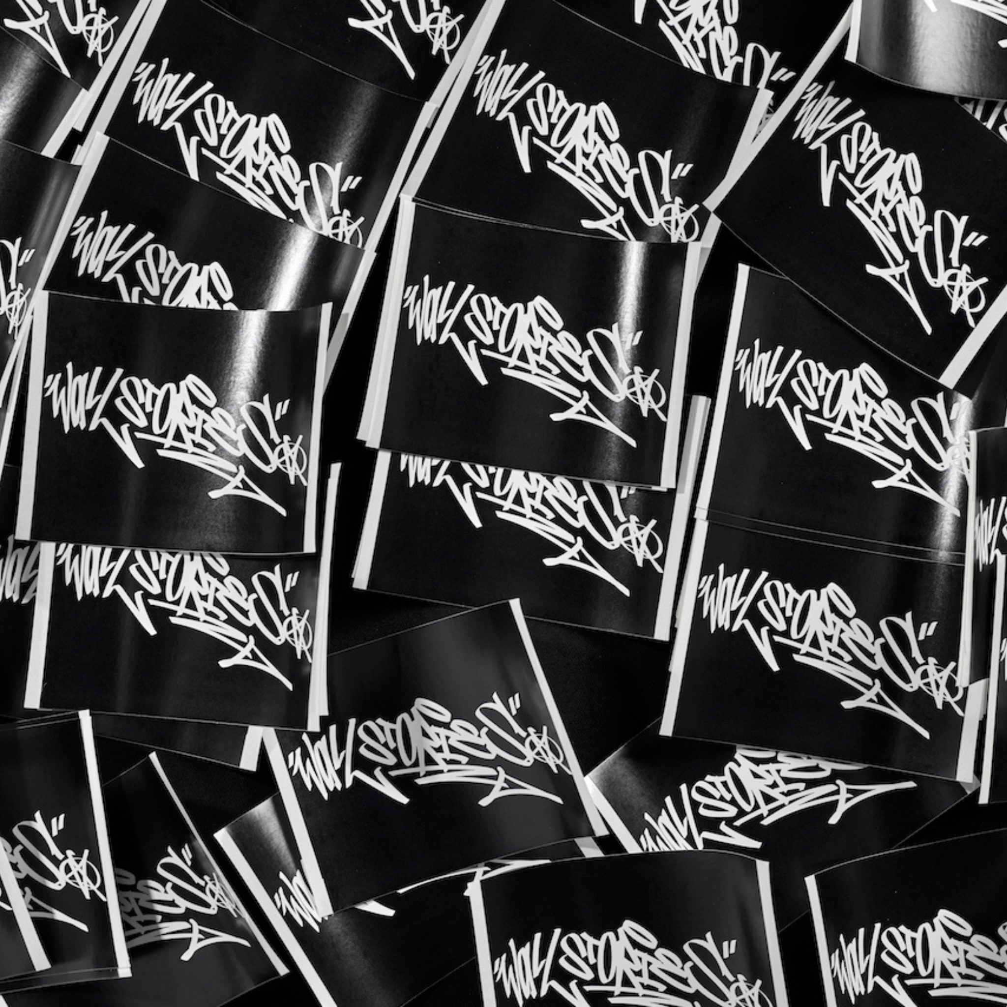 Wall Stories Merchandise - Sticker Flatlay.png