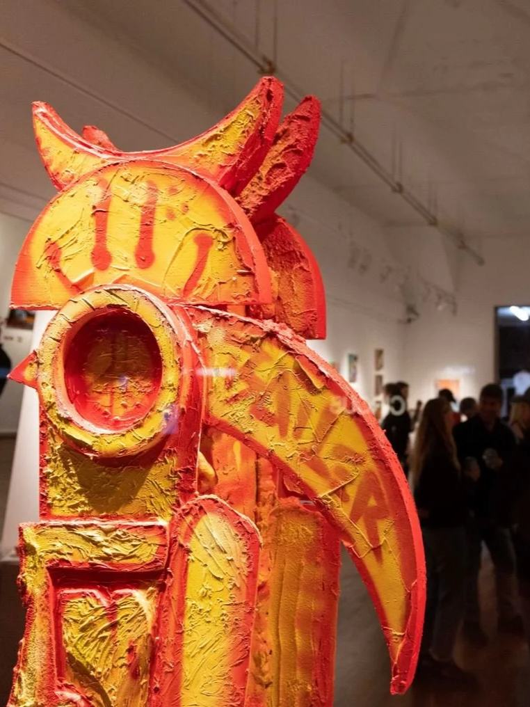 Photograph of bright sculptural artwork at Let's Pretend Gallery. The image is from Melbourne Graffiti Artist Bailer's opening night for their solo exhibition titled 'Mixed Messages'.