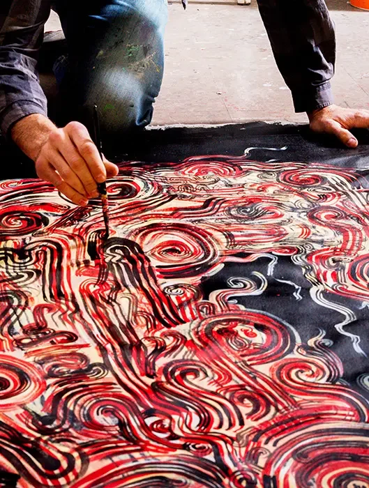 BailerMelbourneArtist_SoloExhibitionDuality_Detail-Bailer-kneeling-red-painting_web.jpg.webp
