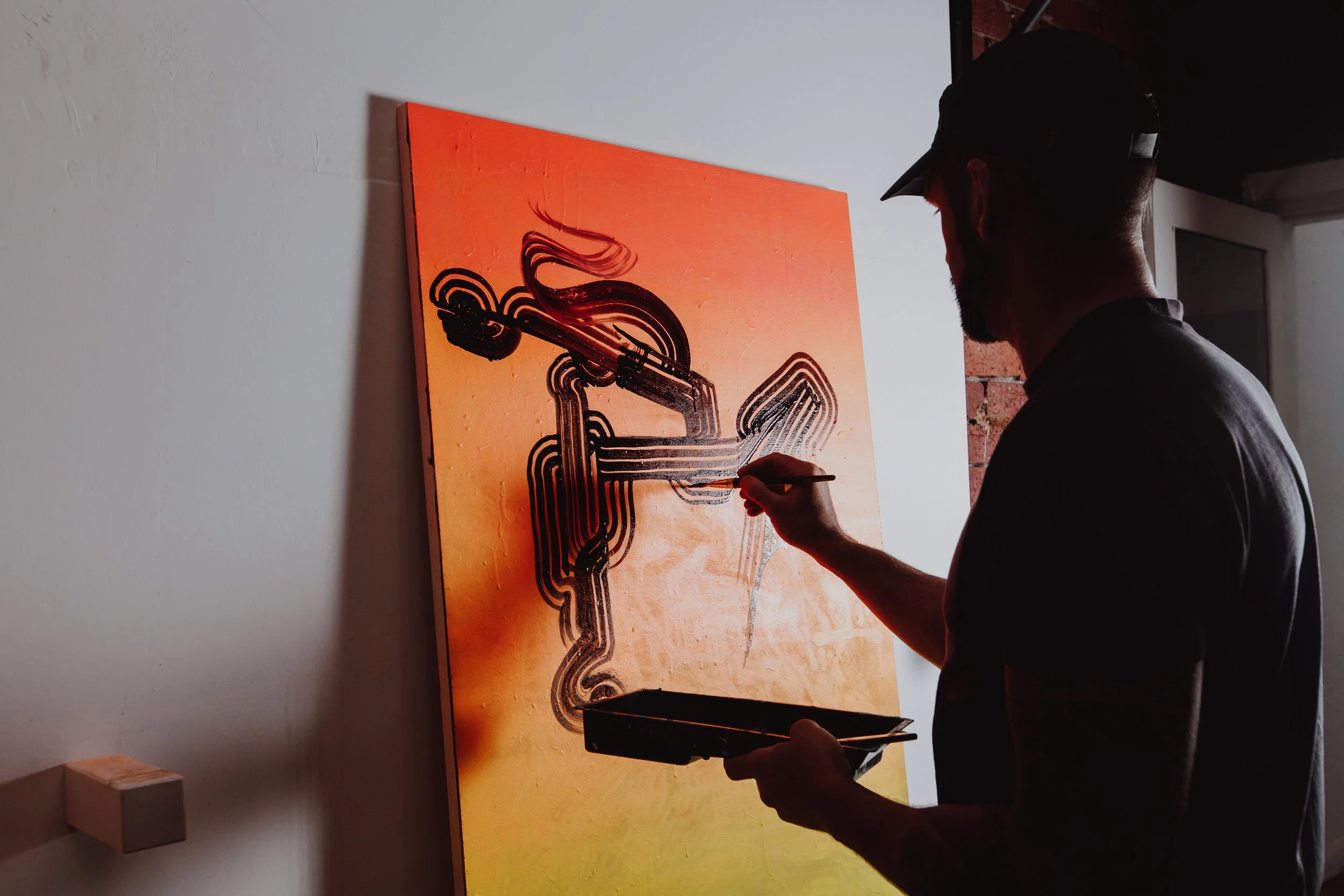 Image of artwork being painted by Melbourne Graffiti Artist Bailer 