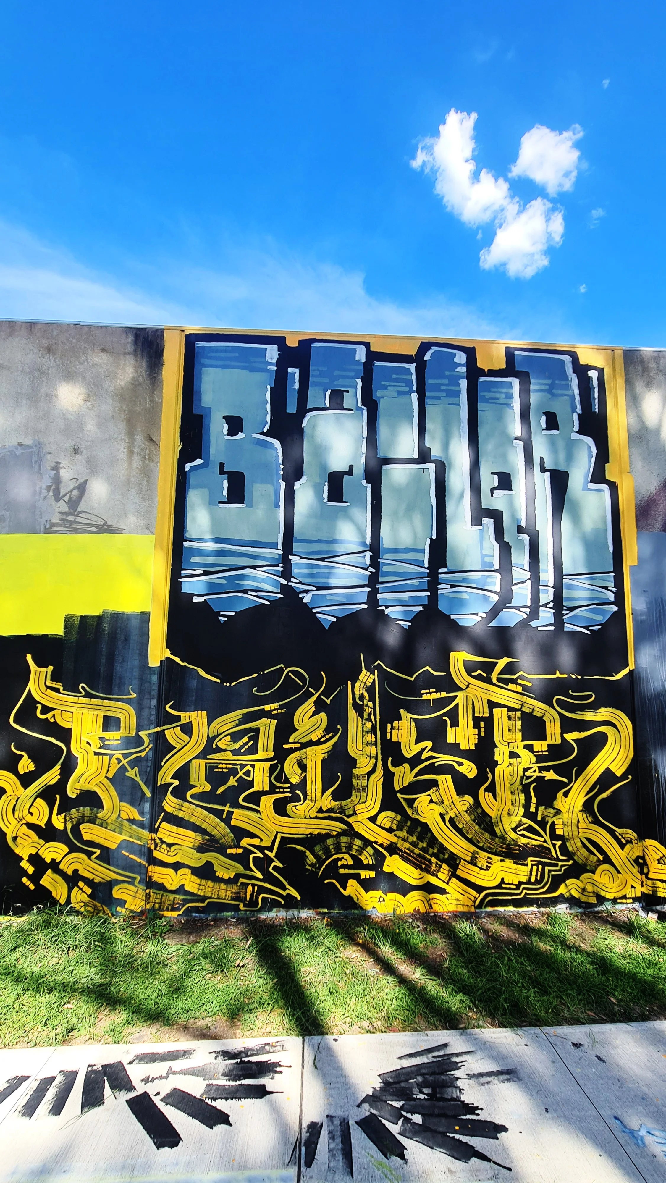 Black and Yellow Multiroller, Melbourne: Melbourne graffiti mural by Bailer, featuring bold black-and-yellow Multiroller lettering with a high roller piece above.