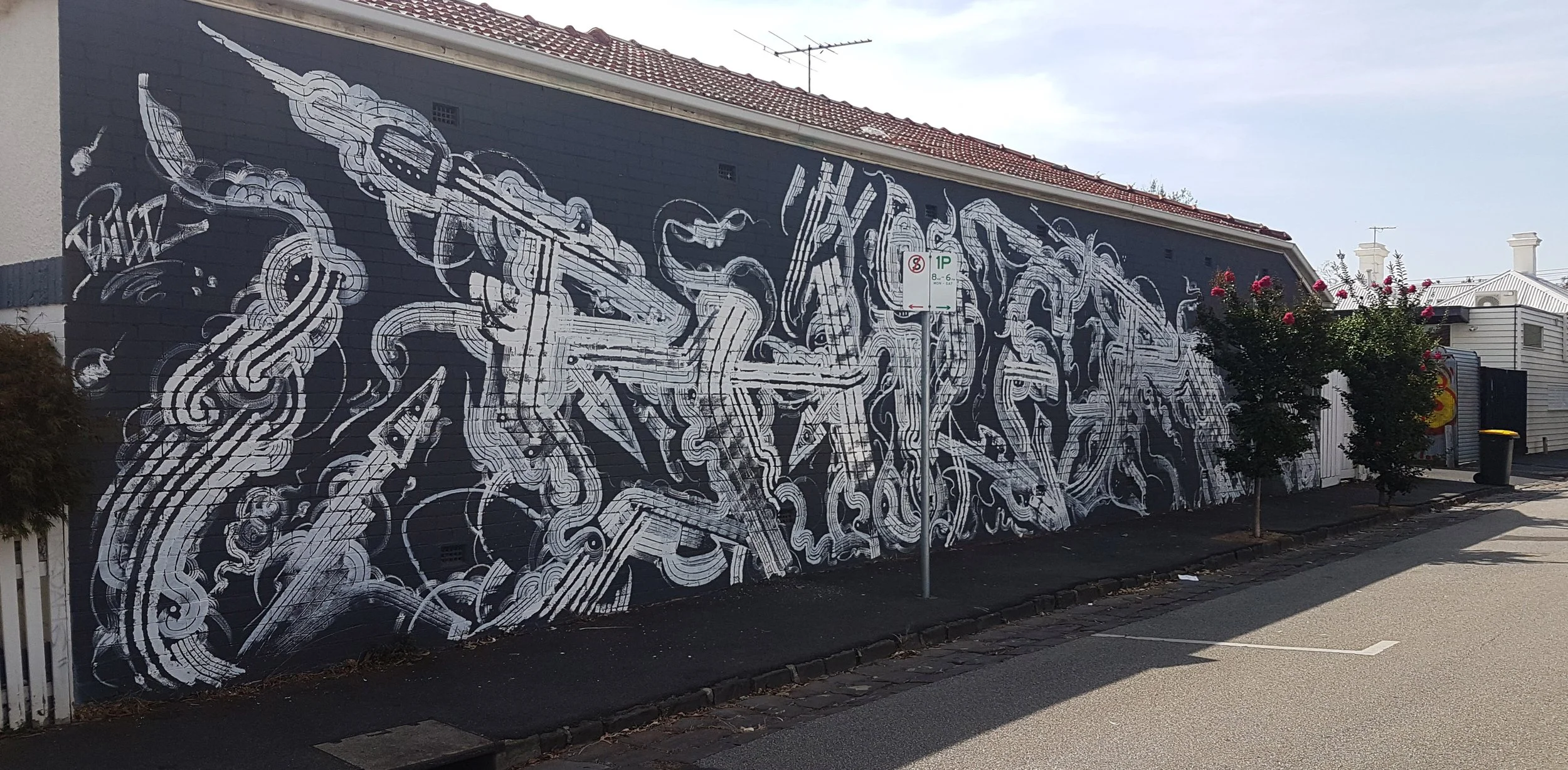 Bailer Multiroller, Balaclava: Balaclava graffiti mural by Melbourne graffiti artist Bailer, featuring single-colour Multiroller lettering created with customised brushes and rollers.