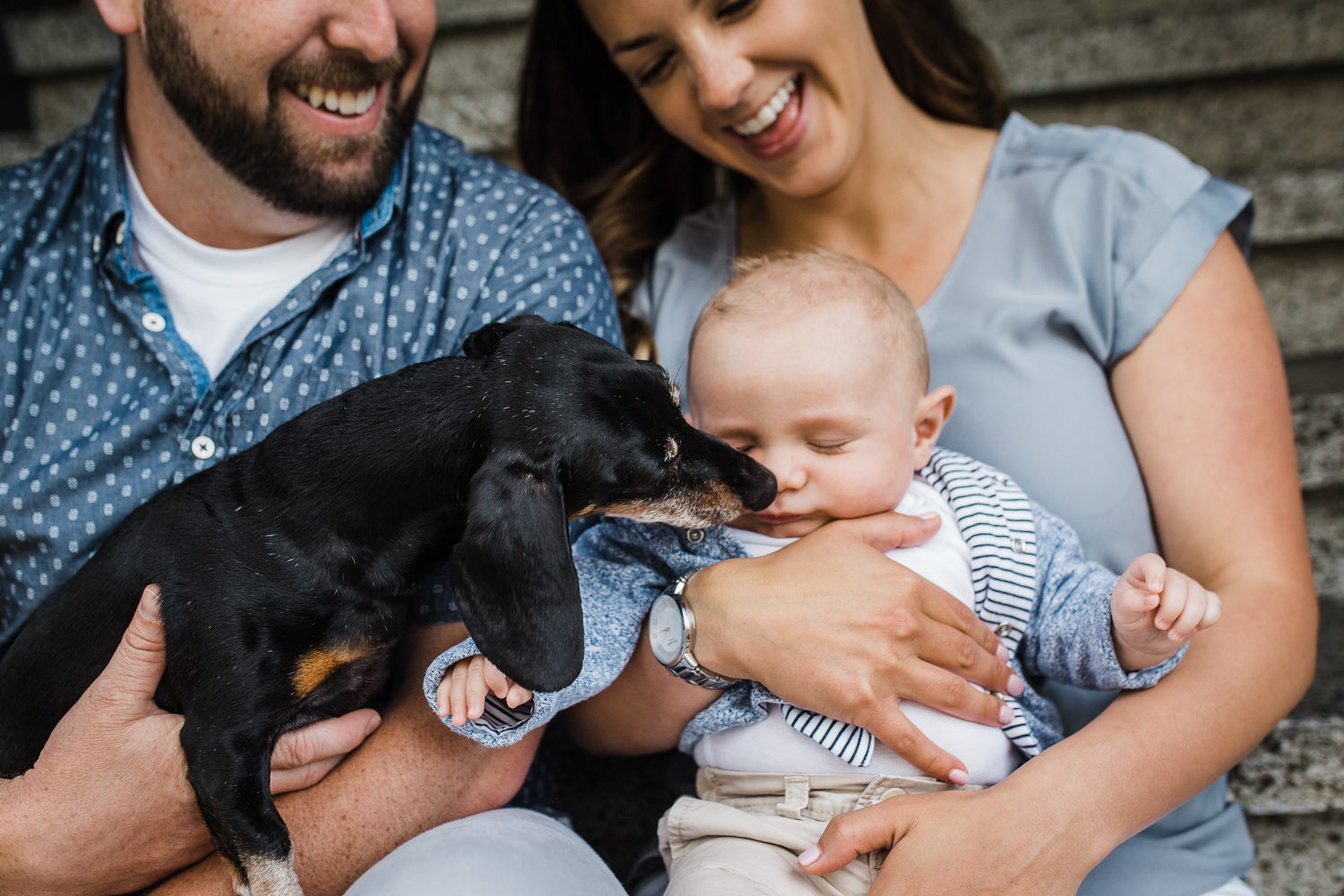 Family photo with dog kissing the newborn baby boy {San Francisco in-home newborn photographer}