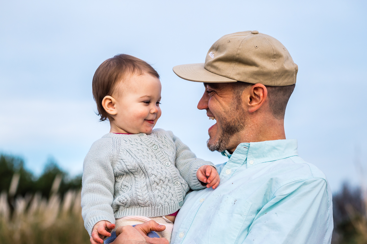 portrait of dad and one year old baby looking into each other’s faces {Alameda Family Photographer}