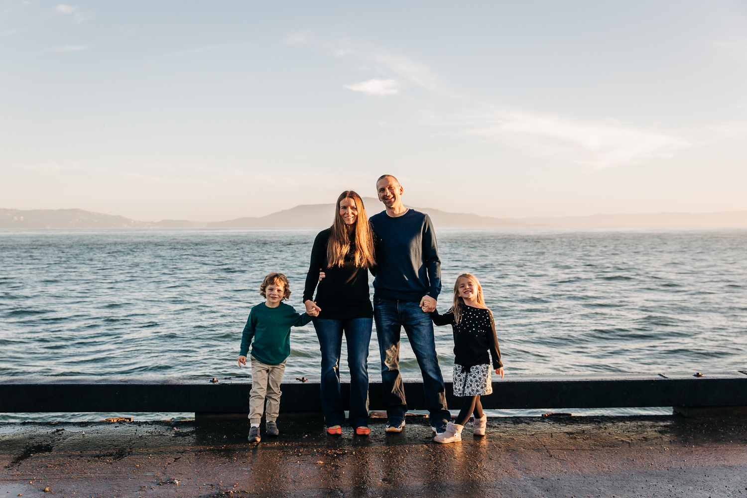 Family portrait with everyone looking at the camera and includes mom, dad, 4 year old boy and a 6 year old girl | SF Family Photography