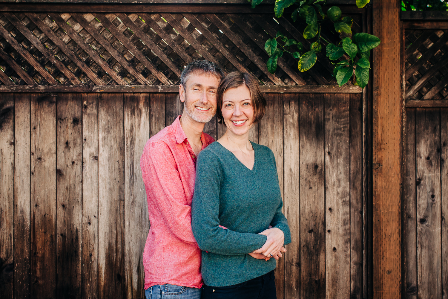 Portrait of a couple standing by a fence | San Francisco Lifestyle Photographer