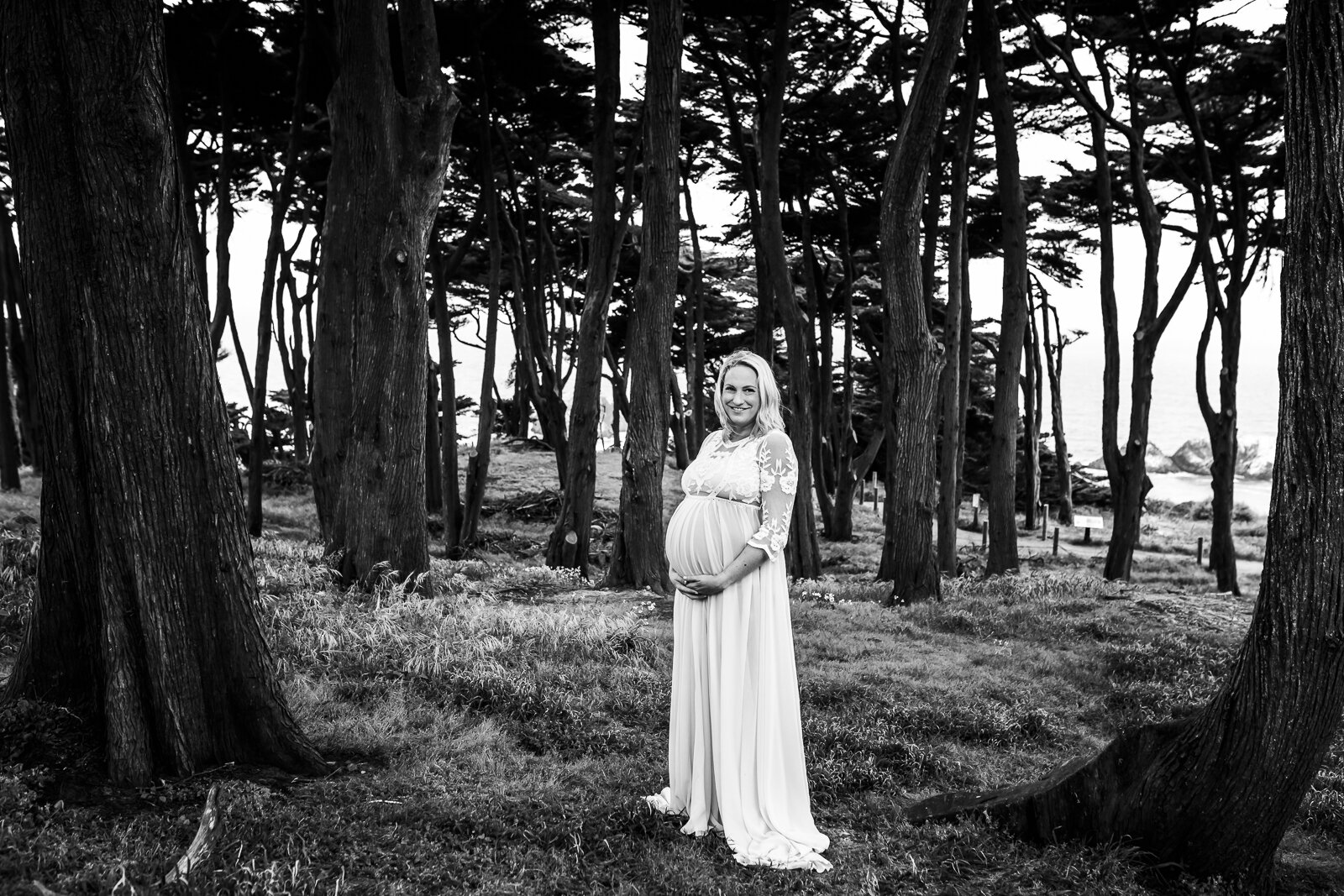 portrait of a pregnant woman standing in the woods - San Francisco Maternity Photography