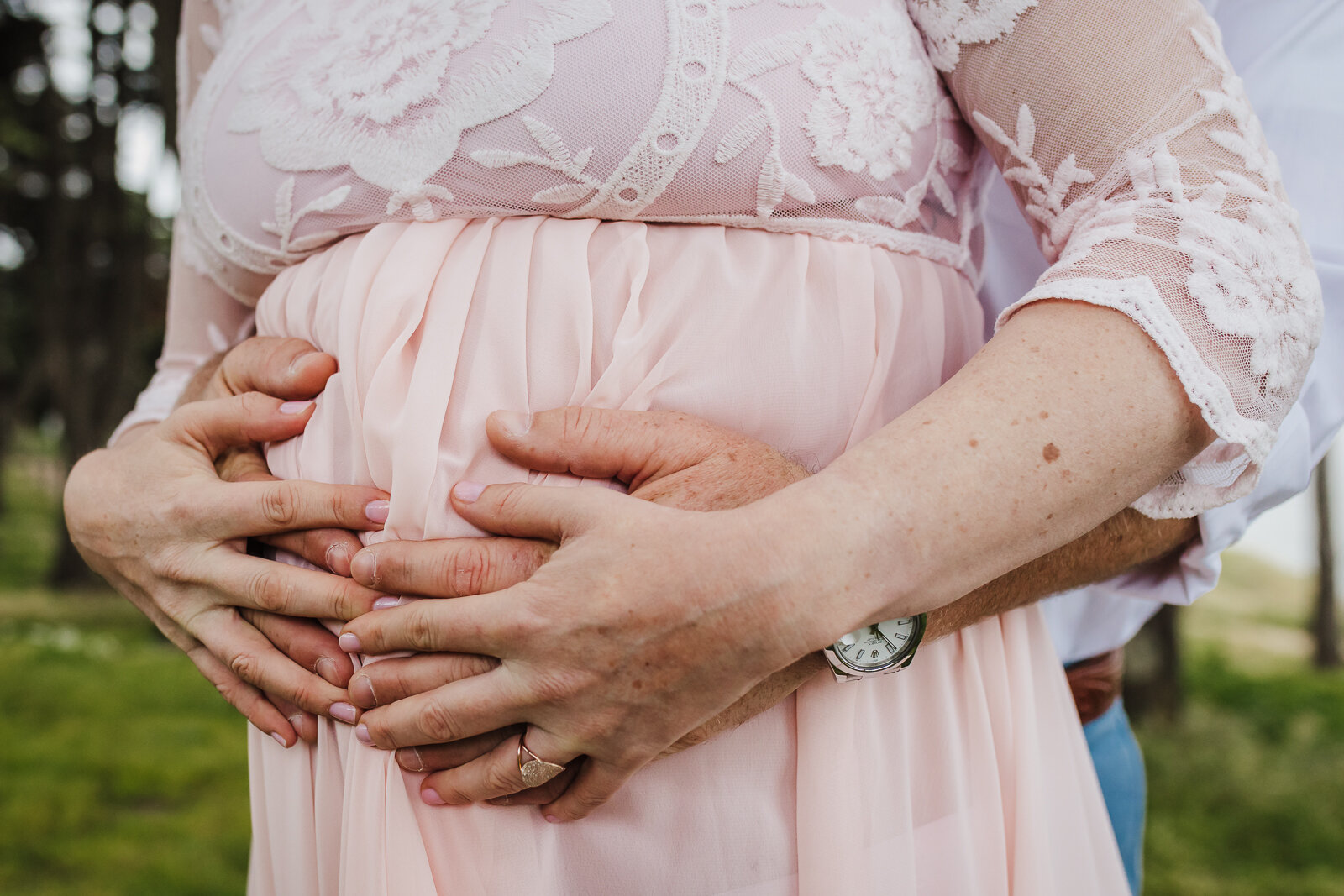 wife and partner's hands on pregnant belly - Bay Area Maternity Photographer
