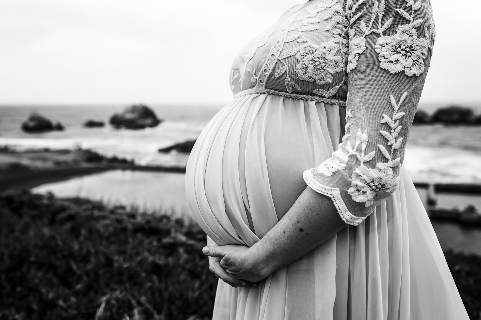 close up of pregnant mom cradling baby bump - San Francisco Maternity Photographer