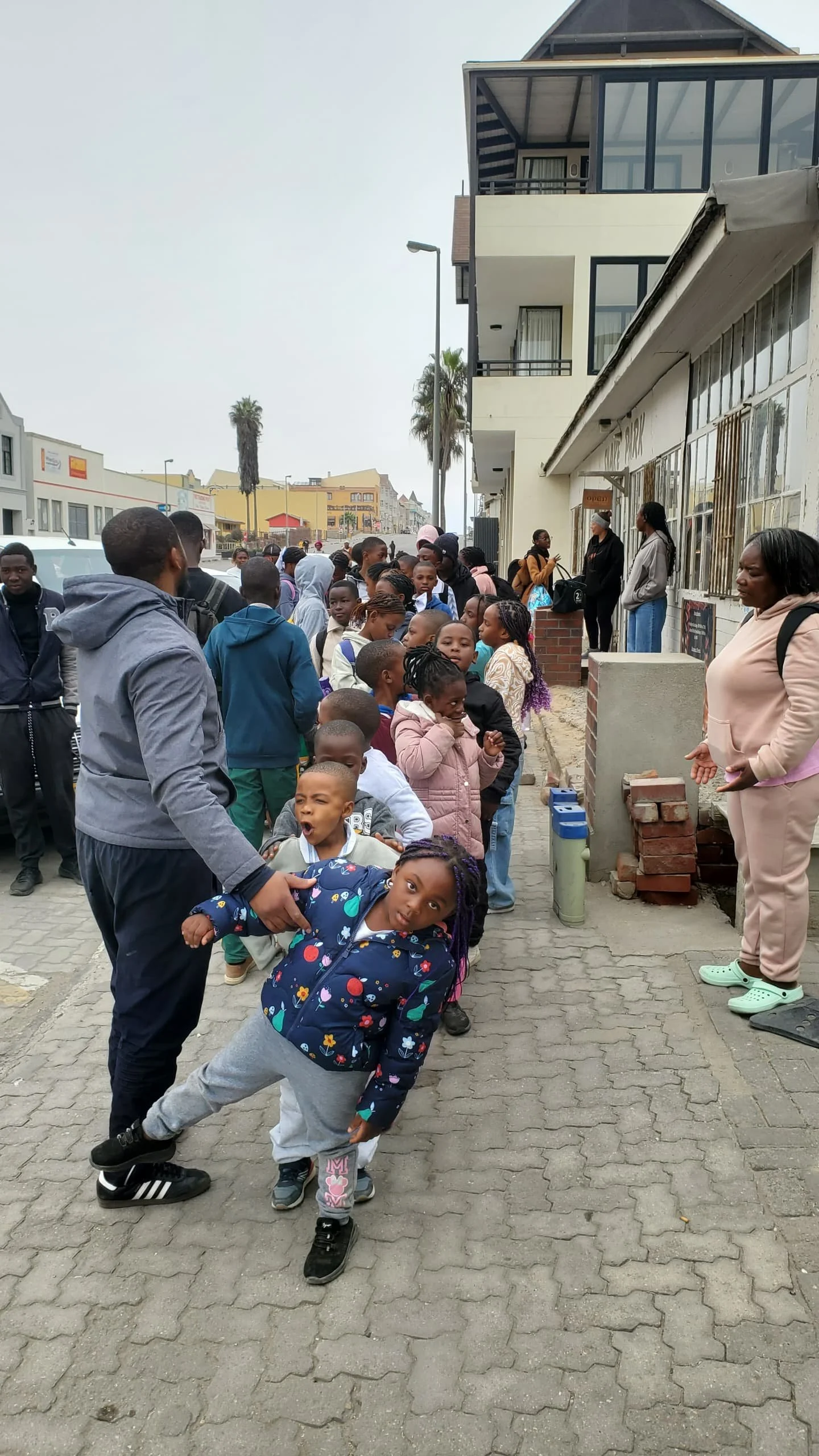 A large group of school children visiting the Living Desert Snake Park in Swakopmund Namibia to learn about how to conserve reptiles in Namibia. Snake Conservation and education in Namibia starting with children. See Black mambas, cobras and adders.