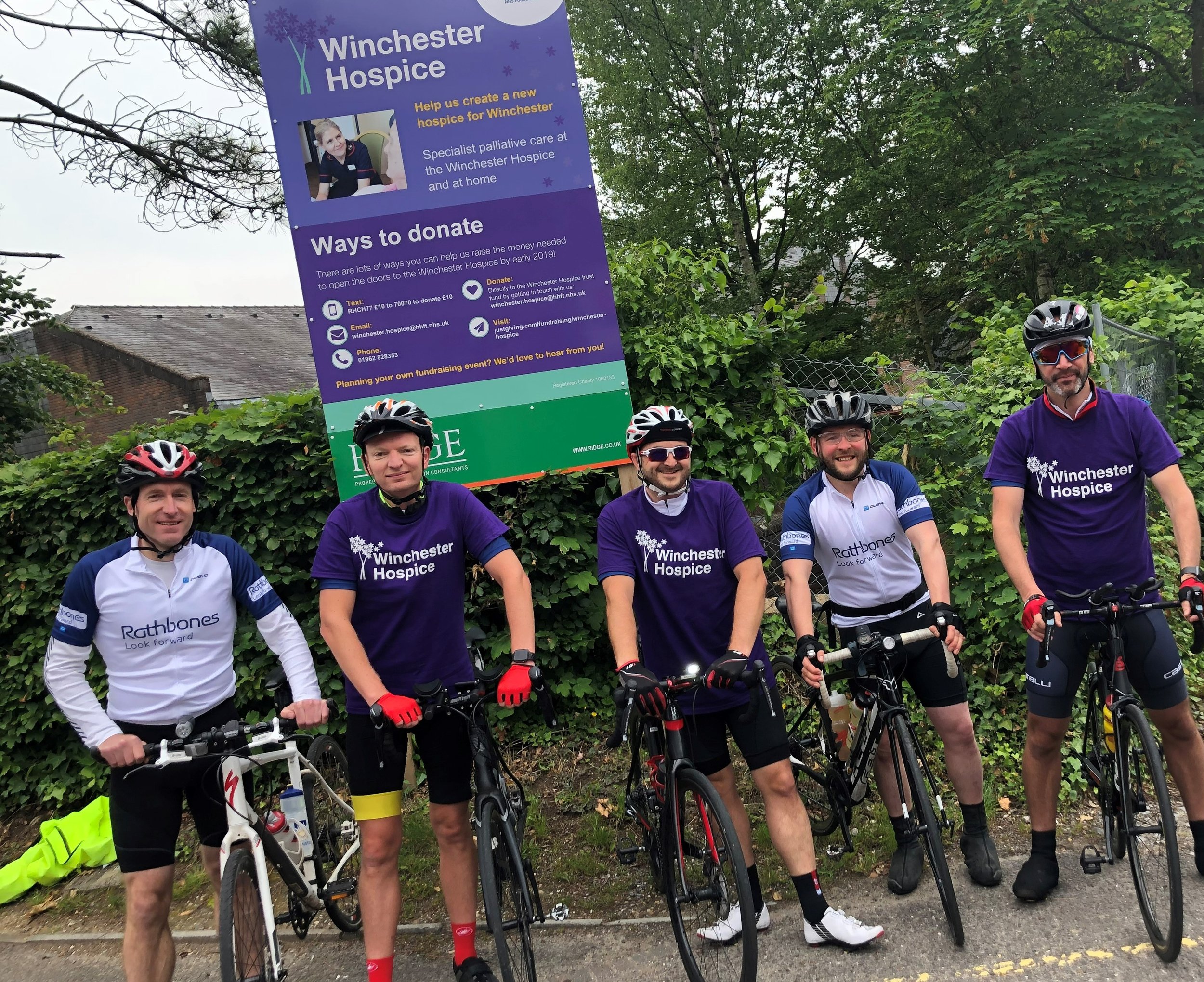  A group of people on bikes outside Winchester Hospice 