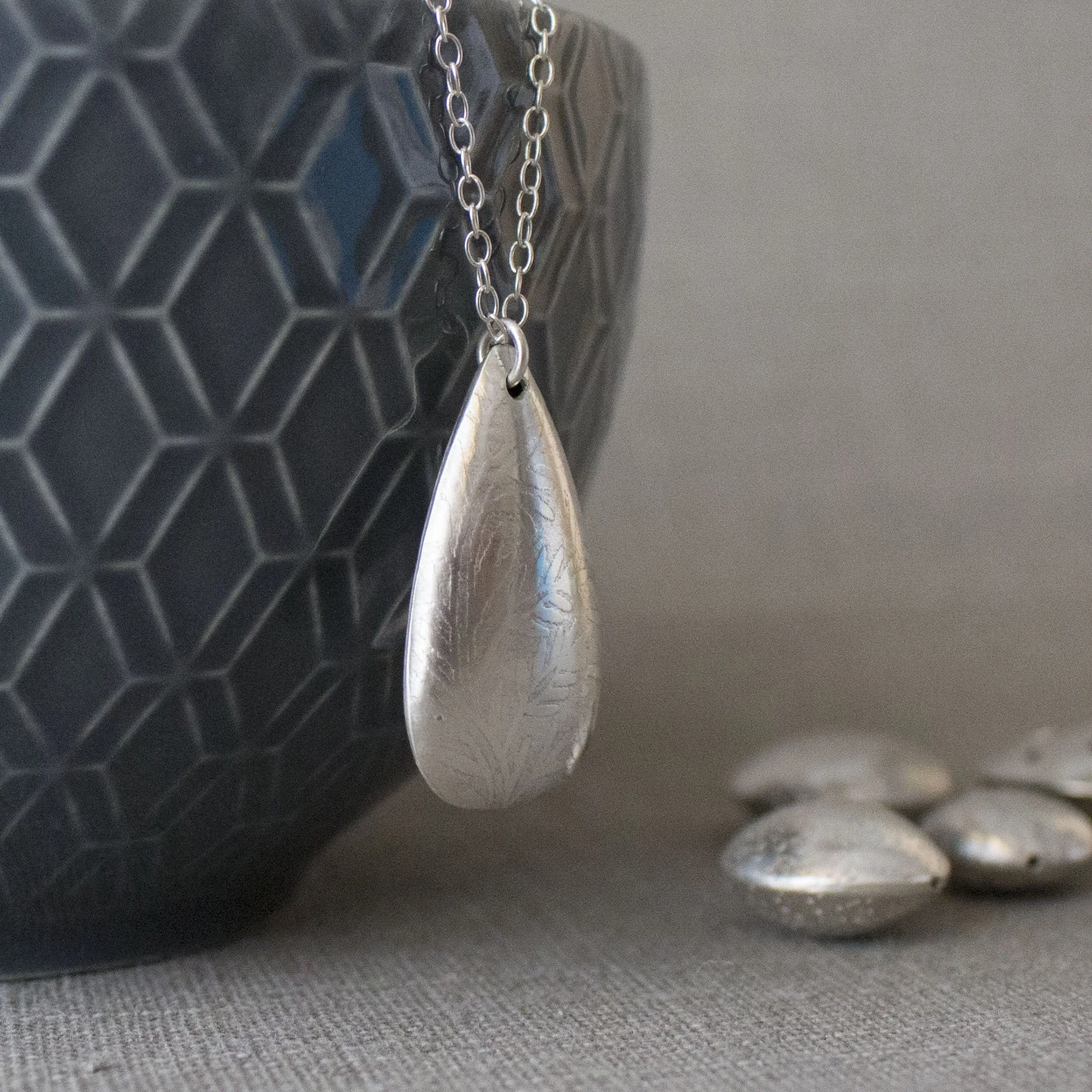 hollow forms pendant sq.jpg