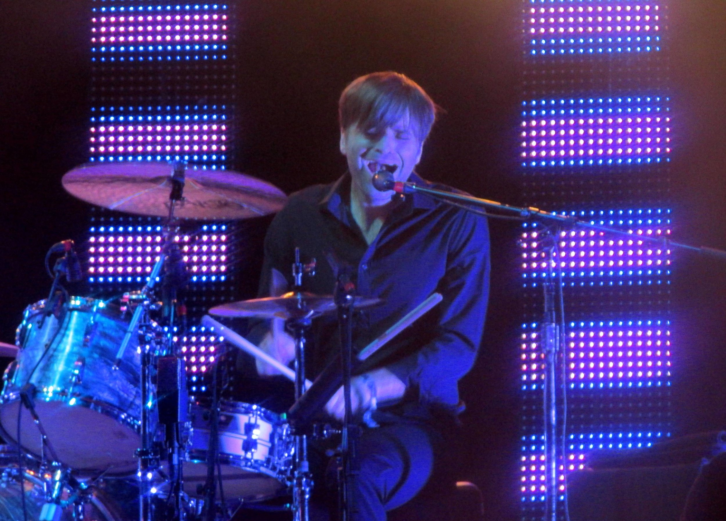 4 - Ben Gibbard, vocalist of The Postal Service, temporarily finding himself behind a drum kit.JPG