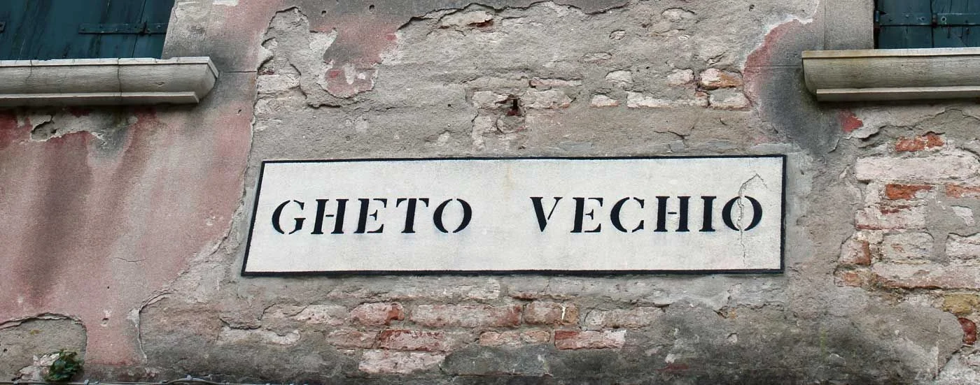 The Venetian Ghetto was the area of Venice in which Jews were compelled to live under the Venetian Republic. The English word "ghetto" is derived from the Jewish ghetto in Venice, originating from the Venetian gheto.