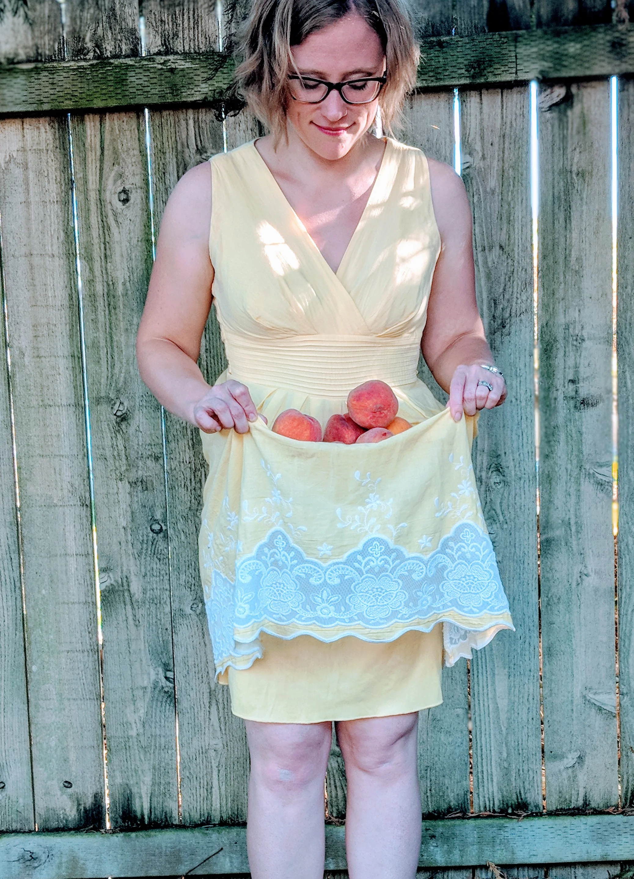 YellowDressLookingatPeaches_Filtered.jpg