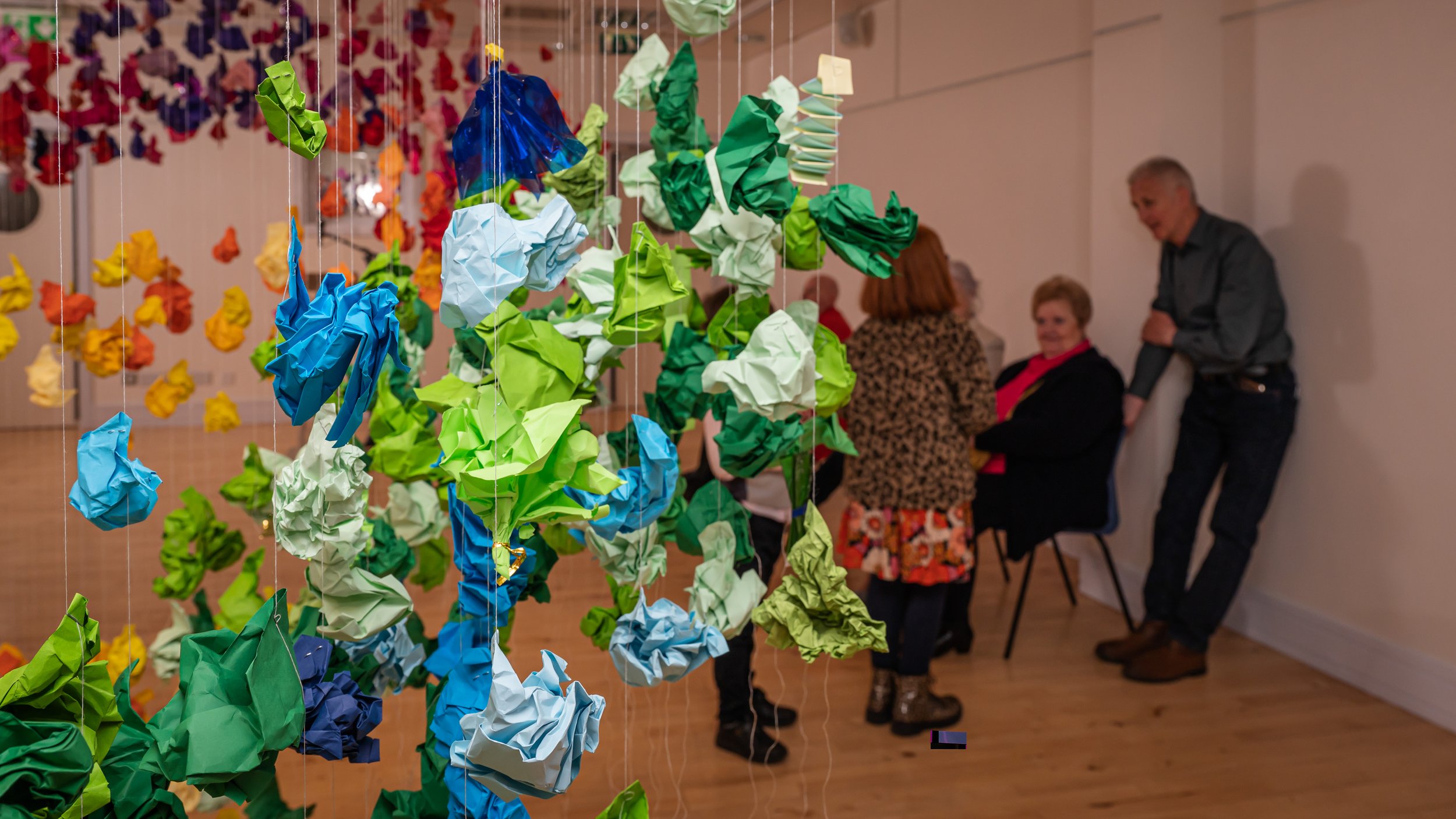 This installation consists of over 2500 pieces of paper shapes, all formed by people with who had differing physical impairments associated with their brain injury.&nbsp; As new confidence grew with the techniques over the weeks of making, different