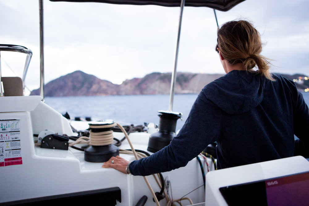 Captain Laurford Elizabeth at the helm.