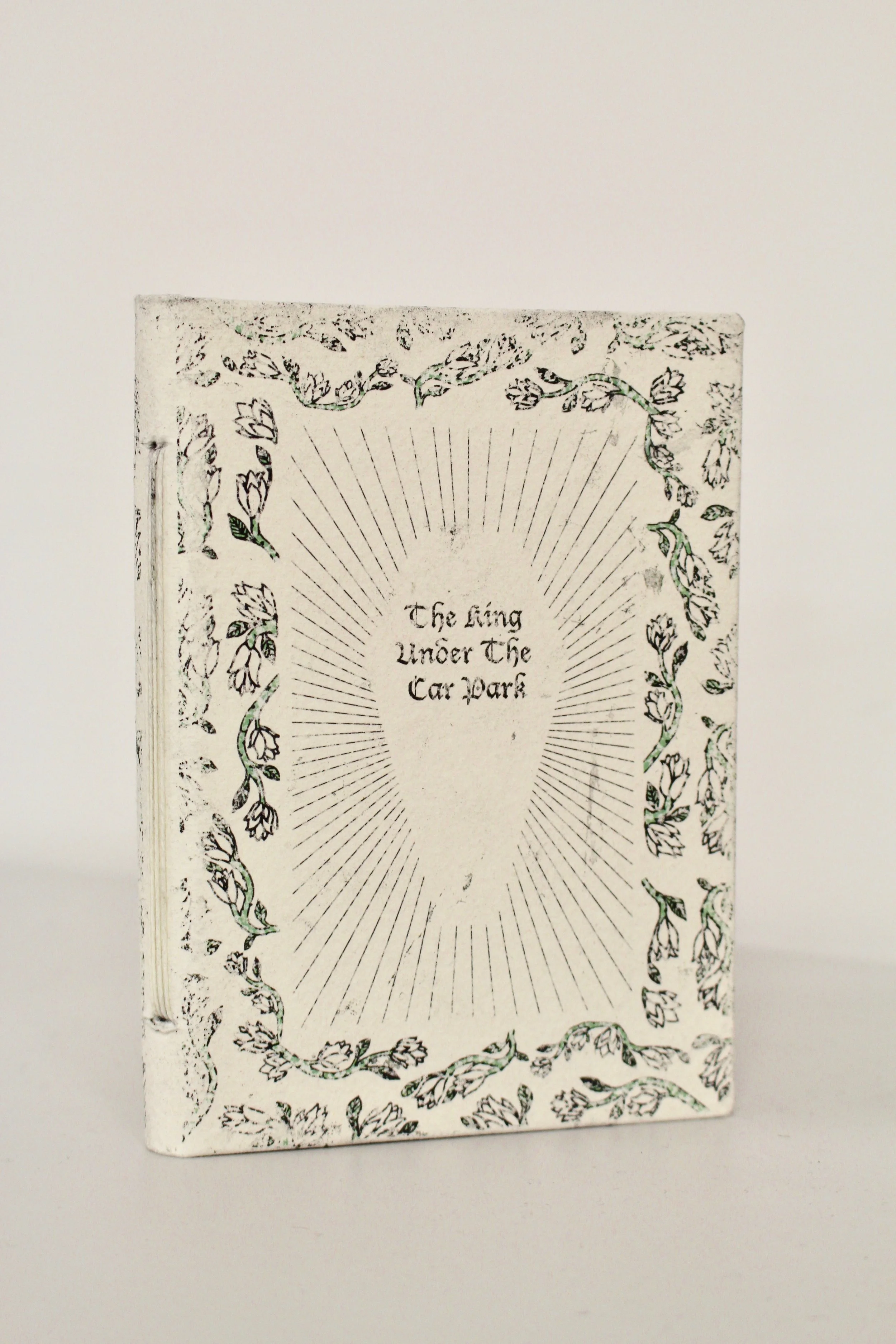 This book is based on my experience of King Richard’s reburial in 2015. I designed the book in a medieval style, with khadi paper handcrafted from india. The paper itself quickly became rough and worn, adding to the ‘aged’ look. As the story progresses, the roses slowly change from white to red. The story of Richard follows in quotes whilst my own story flows. By the end of the book, Richard has been killed and the tudors have won.