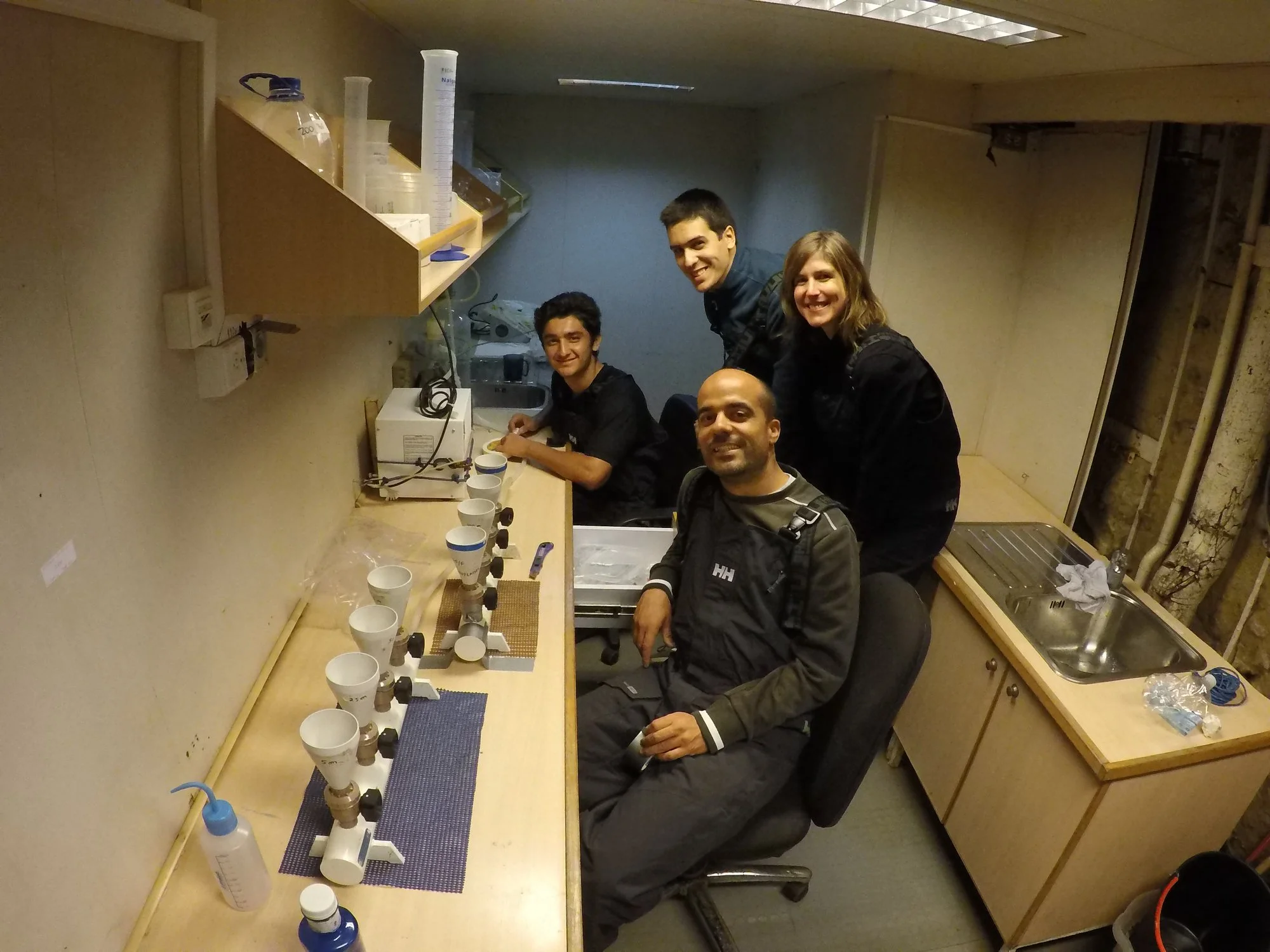 The phytoplankton dream team! On the back (from left to right) is Raúl (Bachelor student from FURG), Afonso and Catarina (researchers from MARE-UL and FCiências. ID), and on the front is Rafael (researcher at FURG and chief scientist of the expedition). Picture taken by Manuela Bassoi.