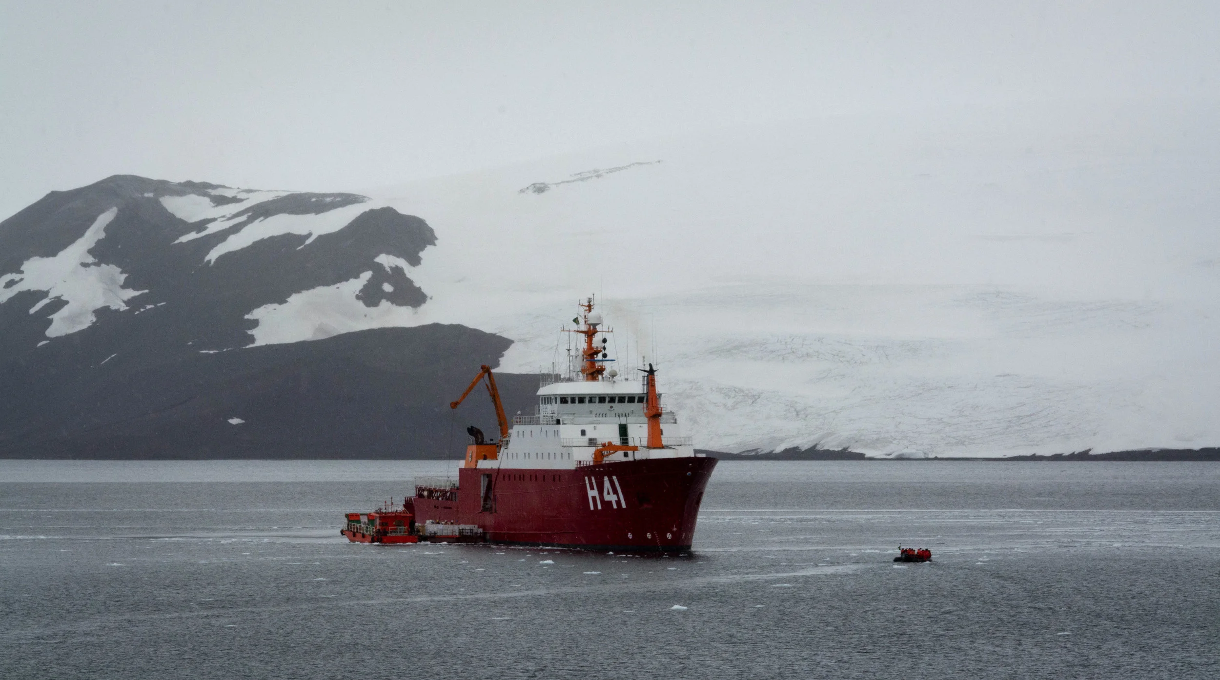 View of the polar ship Admiral Maximiano with the King George Island on the background.