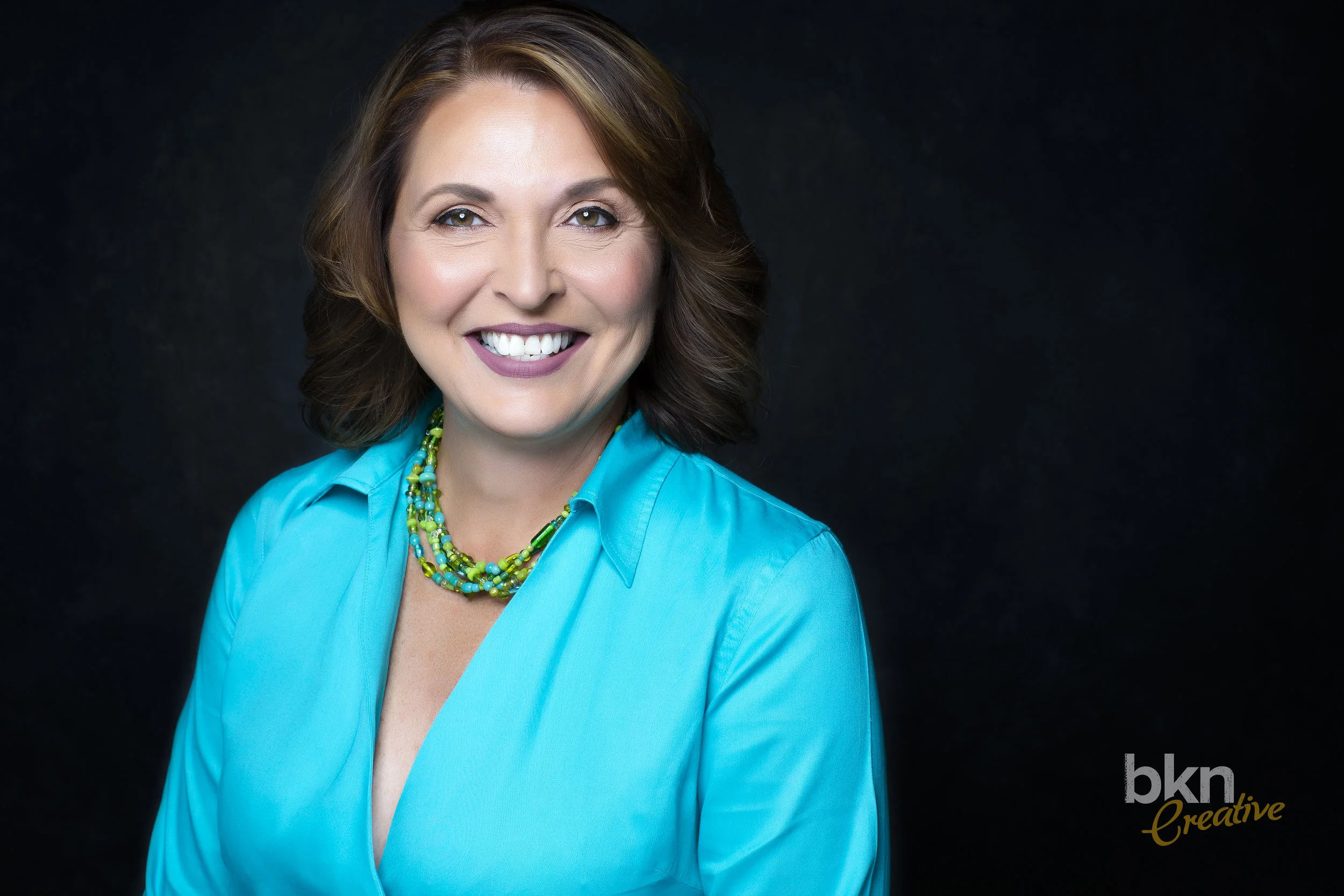Christine_Lange_Headshot_Image3_Logo.jpg